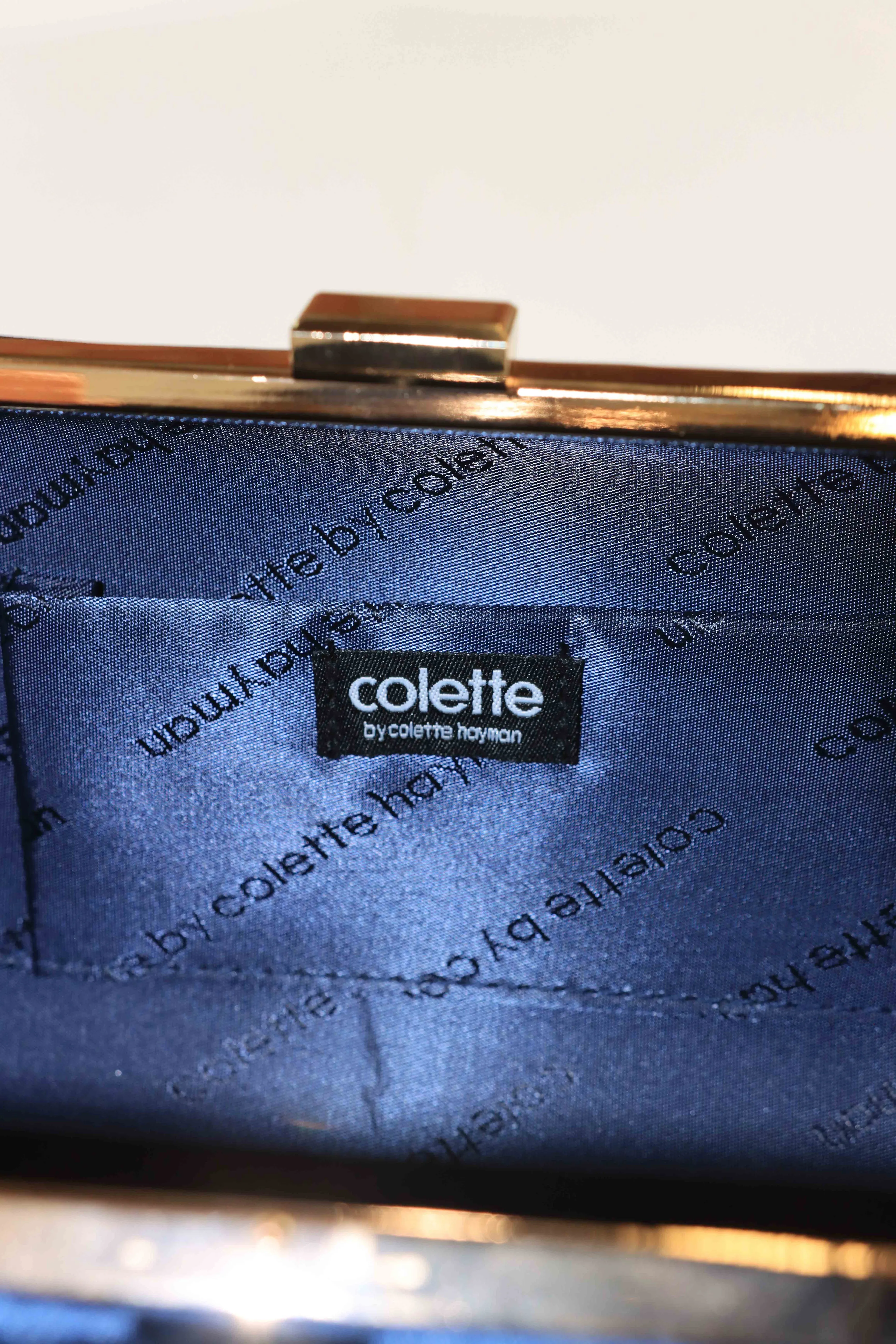 Colette Navy Satin Clutch