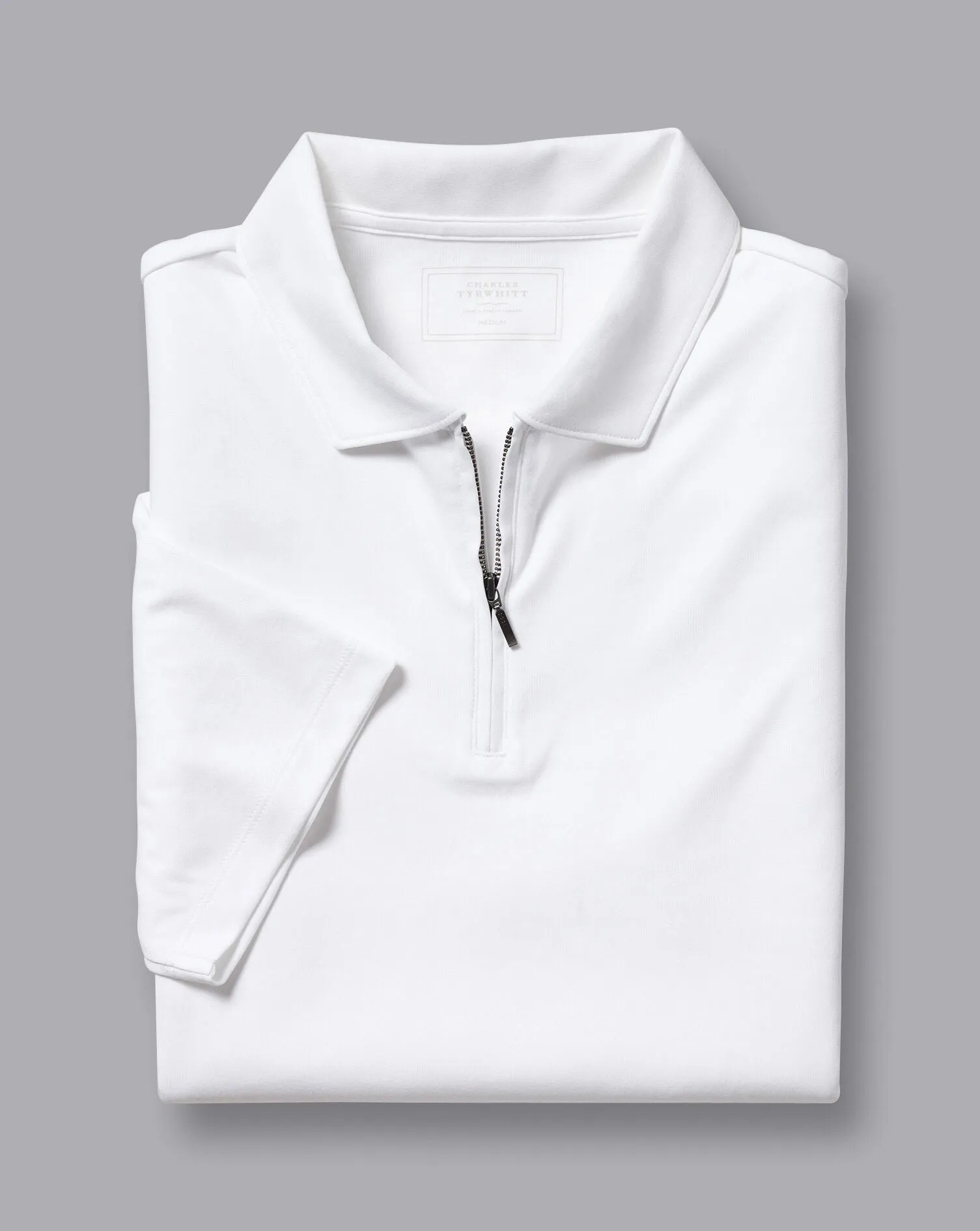 WHITE PLAIN SHORT SLEEVE ZIP JERSEY POLO